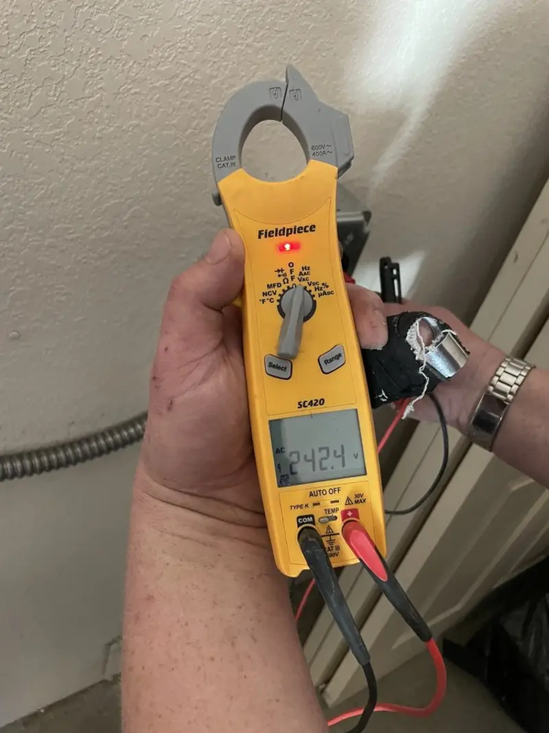 Voltage testing with clamp meter during Recessed Lighting Installation in Pohatcong